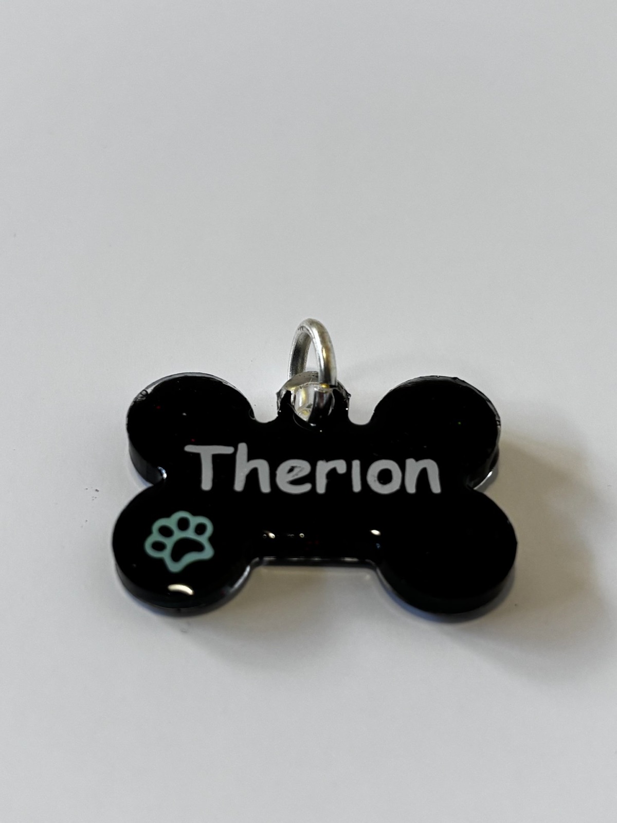 Médaille epoxy forme os noire 4cm